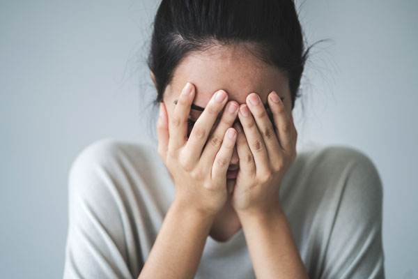 How do women experience depression?